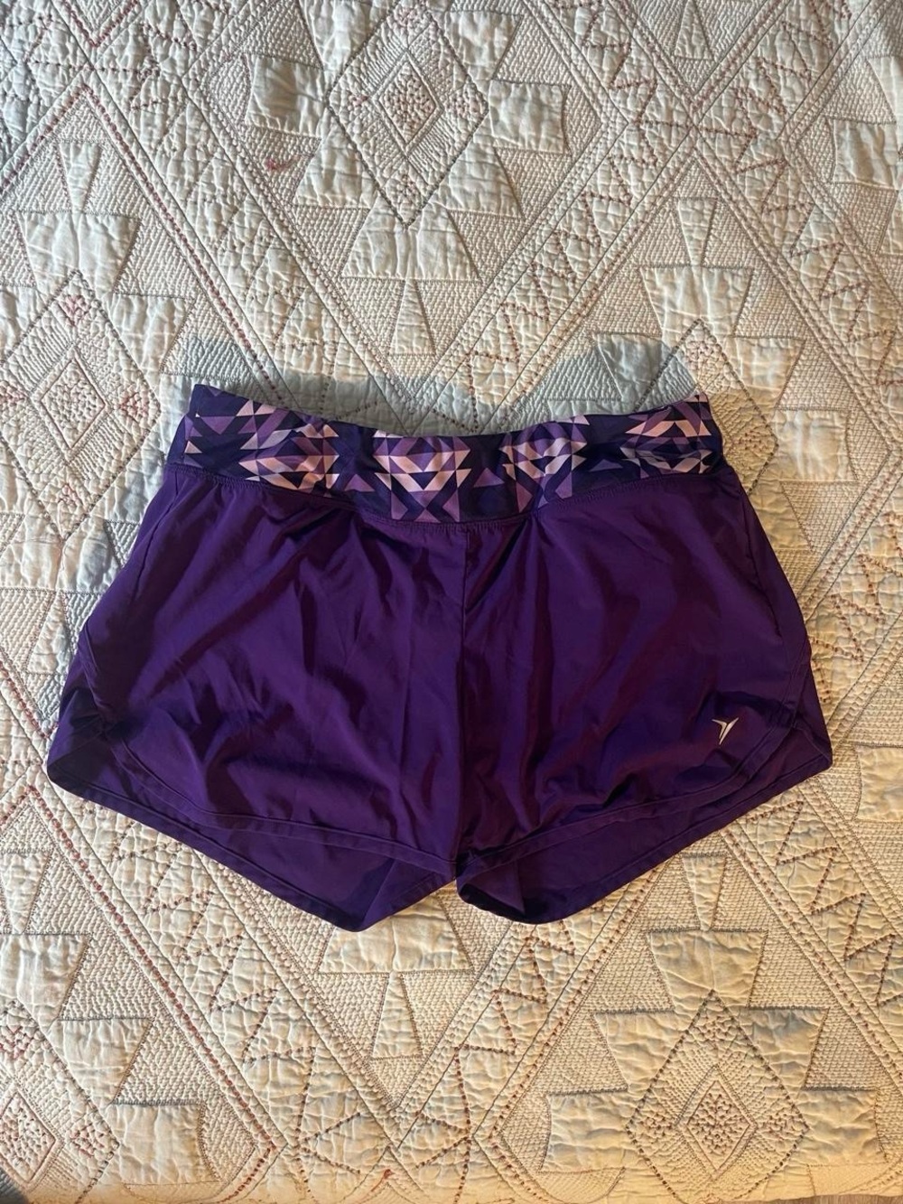 Old Navy purple shorts with geometric pattern on waistband